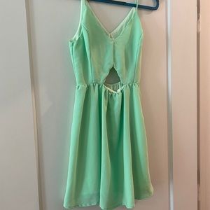 Mint green dress with cutouts
